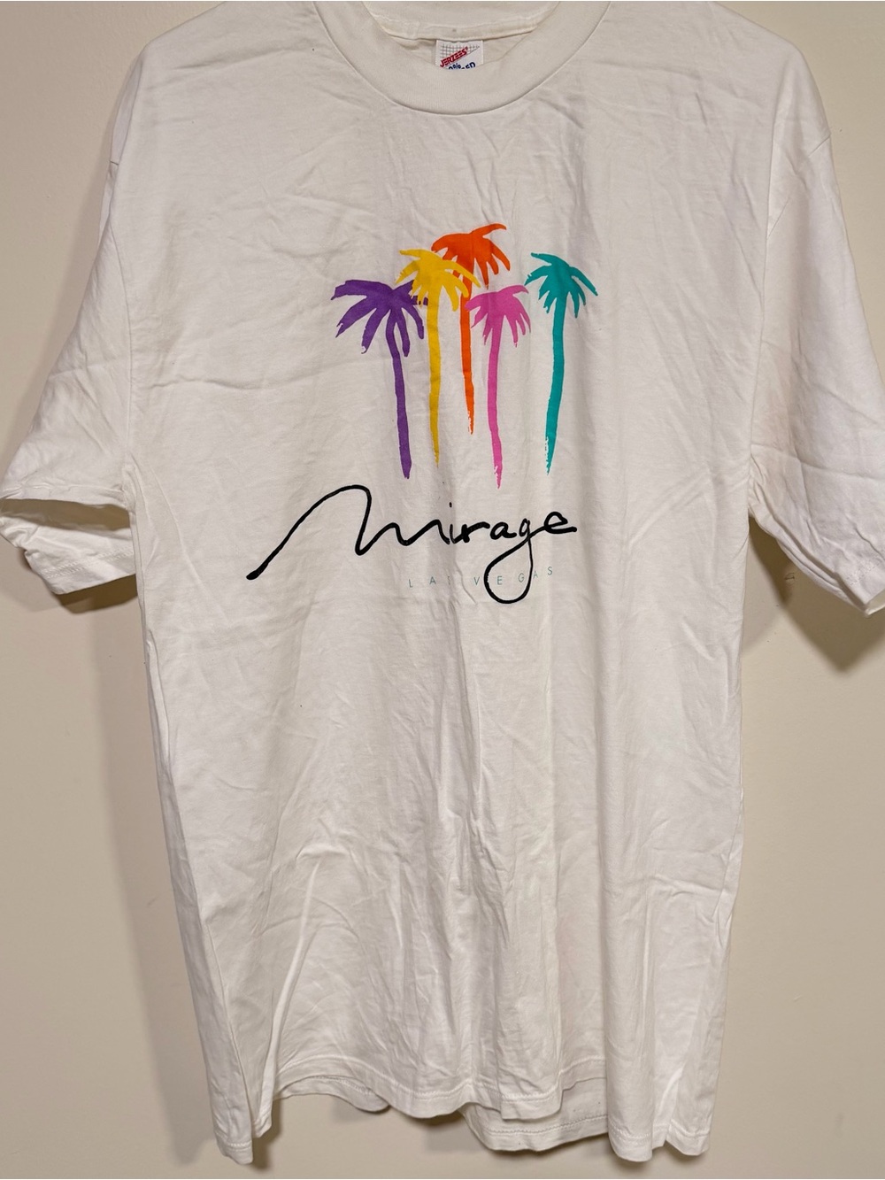 Vintage Las Vegas Mirage Casino & Hotek White T-Shirt with Colorful Palm Graphic